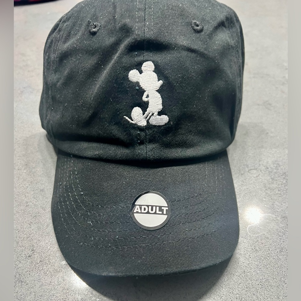 Adult all black with whiteout Mickey. Rare find.